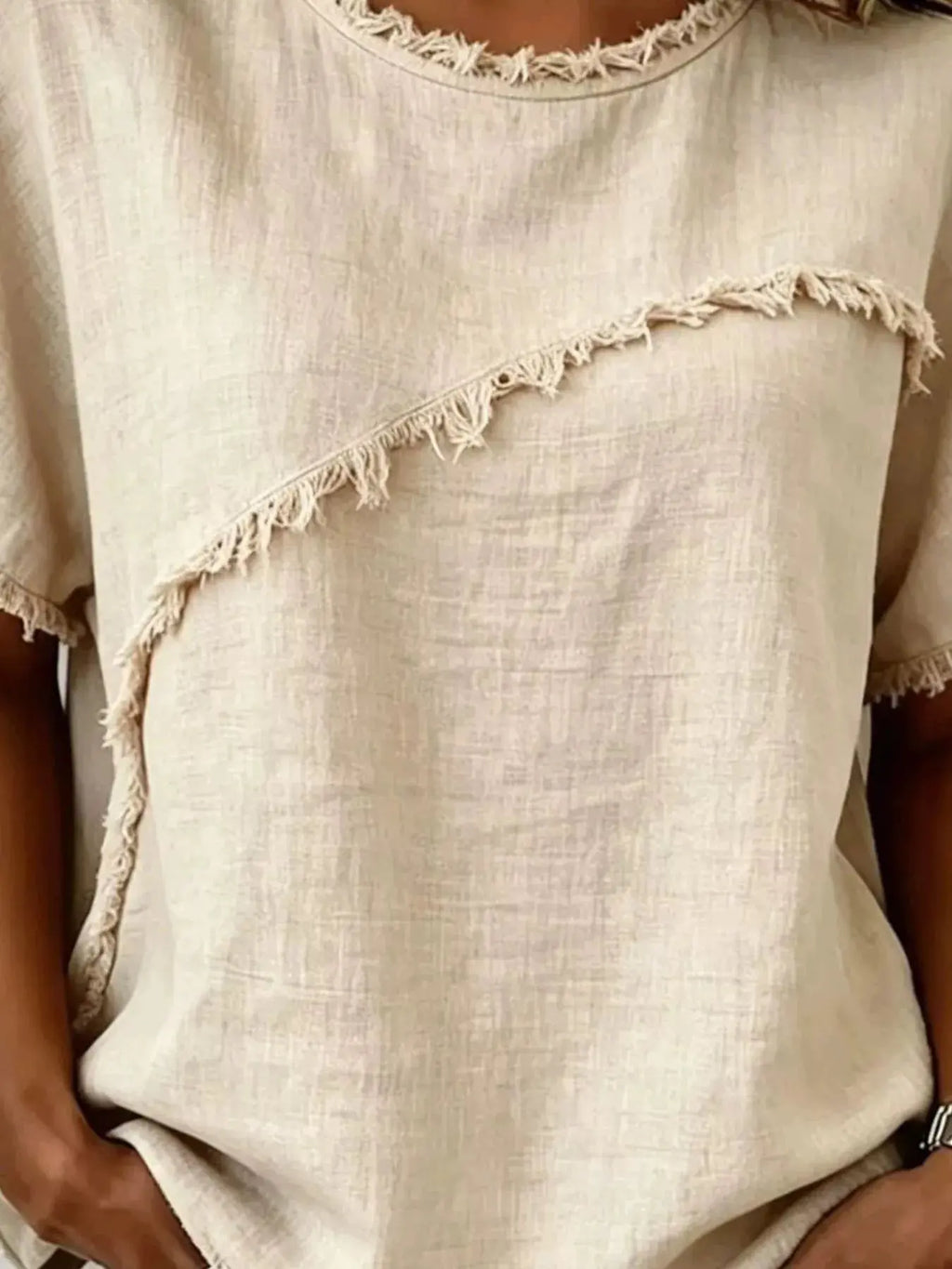 Plus size khaki short sleeve top with frayed hem, casual style, from Trendsi, showcasing the relaxed fit and distressed detail.