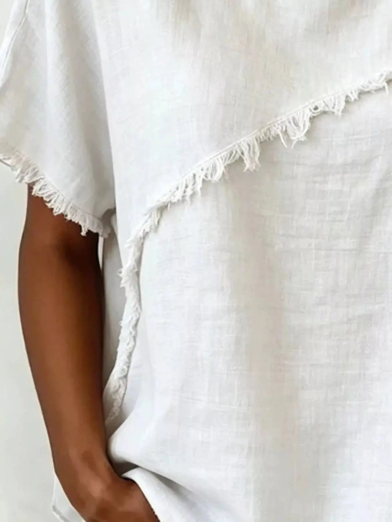 Plus size khaki short sleeve top with frayed hem, casual style from Trendsi, shown on a mannequin.